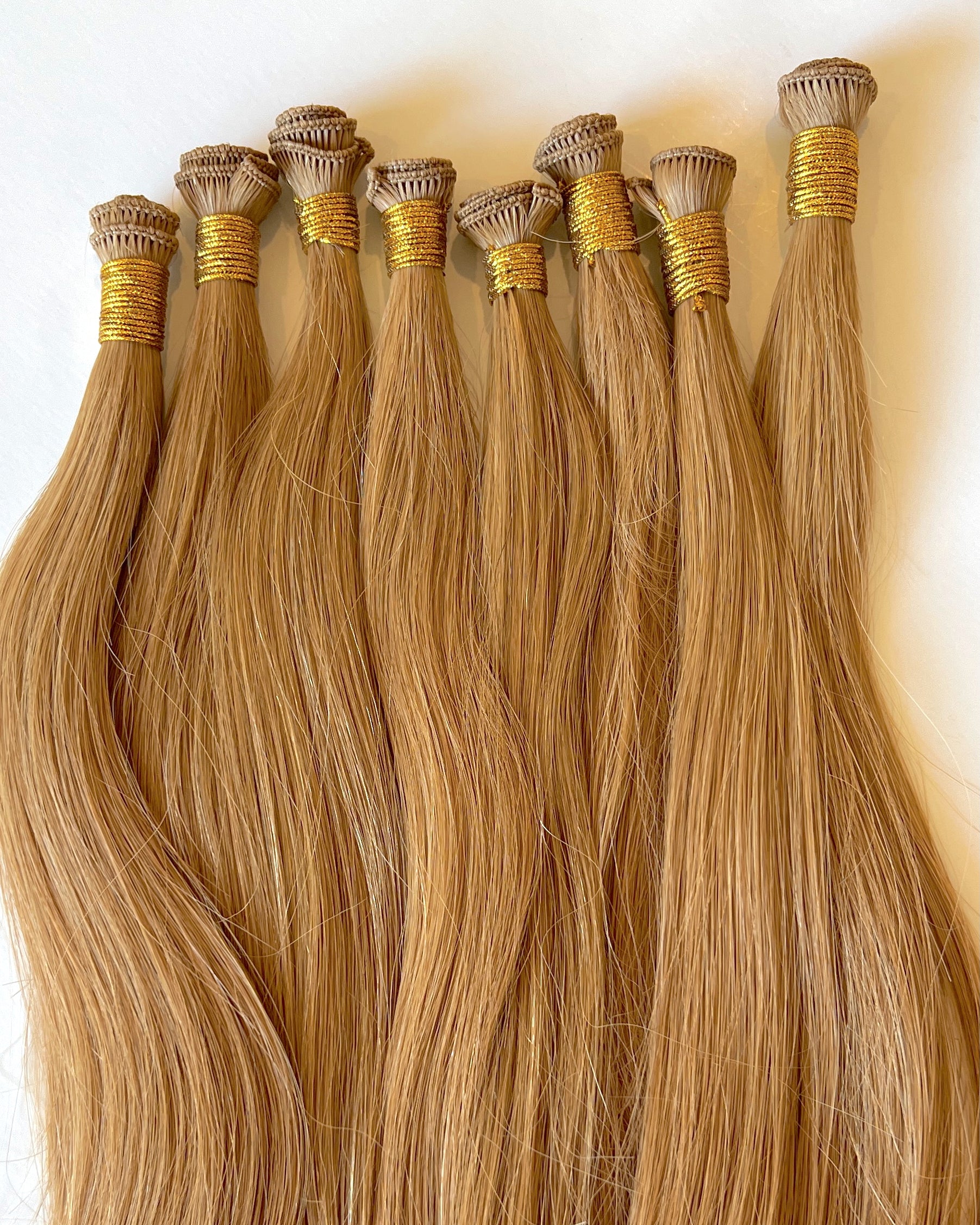 Hand-tied Extensions